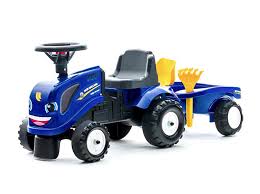 Falk New Holland Ride-on Tractor with trailer, rake & shovel - Image 3